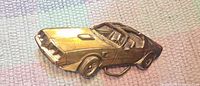 Front view of gold-tone 1979 Trans Am belt buckle