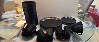 Group shot of entire 32-piece black Arcoroc dinnerware set on table