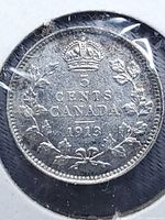 Reverse: crown over 5 CENTS CANADA 1913 within wreath