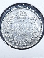 Reverse showing crown, 10 CENTS CANADA 1930 within maple leaf wreath