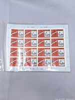 Full sheet in protective sleeve showing 20 stamps