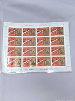Front view showing entire sheet of 20 stamps in protective sleeve