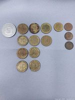 All fifteen German coins laid out showing obverse sides