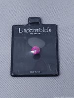 Full view of gemstone inside Lindenwold’s Fine Jewellers sleeve