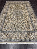 Full view of Naein rug showing full pattern and fringe