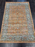 Full view of the rug showing complete pattern and borders