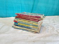 Stack of Archie digest comics showing spines and wear
