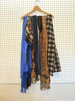 All five scarves hanging on hanger