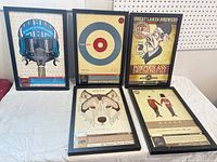 Group shot of all five framed beer posters