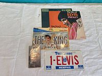 All items arranged together on cloth background