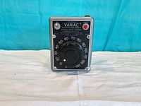 Front view showing control panel, dial and reset button