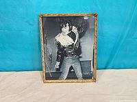 Front view of framed John Lennon photograph print