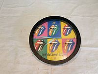 Front view shows multicolour Rolling Stones tongue logo dial and overall condition