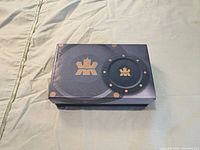 Outer cardboard sleeve showing RCM logo