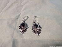 Front view of both sterling silver Bali earrings