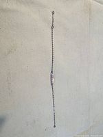 Full view of sterling chain bracelet laid flat