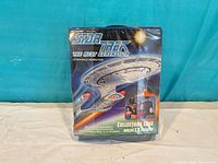 Front of collector case showing Star Trek The Next Generation branding