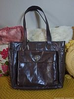 Front view showing overall condition, flap pocket and turn-lock hardware