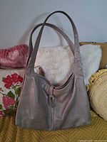 Front view of Rialto grey leather shoulder bag