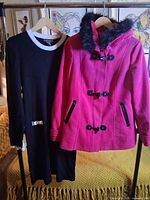 Both coat and dress hanging, full view