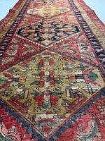 Angle view highlighting central multi-medallion design and colors