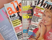 Group of four overlapped magazine covers showing titles and main cover lines