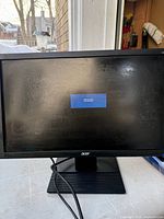 Front view of Acer monitor showing screen and stand