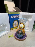Figurine, styrofoam packaging, and outer Garfield box