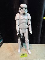 Full-view of the 11.75-inch Stormtrooper figure standing with blaster accessory
