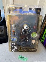 Front view of sealed Dr. Finkelstein action figure package with accessories visible