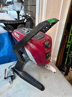 Side view of Titan 1500 ControlMax airless sprayer showing stand, housing and power cord