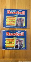 Front of both 1987 O-Pee-Chee Baseball Sticker packs showing blue wrappers and graphics