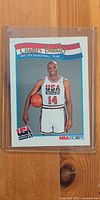 Front of 1992 NBA Hoops Charles Barkley USA Basketball card #575 in protective sleeve