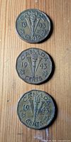 Three 1943 Canada 5-cent coins reverse side showing V Victory design