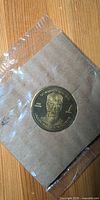 Obverse of coin showing Rob Blake portrait inside sleeve