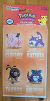 Front of sealed Sandylion Pokémon sticker pack showing header card, Pikachu logo, and four sticker designs