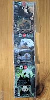 Three WWF Animals of the World pins in packaging