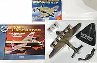 Overall contents: box lid, booklet, model, stand and parts displayed