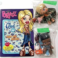 Activity book with both bagged Baby Bratz dolls and accessories