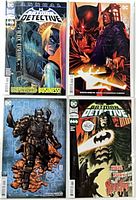 Front covers of all four bagged Detective Comics issues
