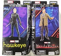 Front and angled view of both boxed figures side by side