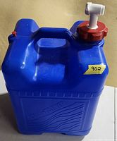 Front angled view showing full container, handle, cap, lot sticker