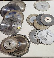 Top view showing full assortment of blades spread on table