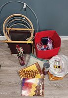 Lot overview with needles, hooks, hoops, books, bins