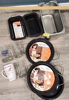 Overall lot with silicone bakeware, stainless pan, glassware and ceramic mug