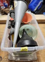 Top view of bin showing multiple funnels of different sizes and colors