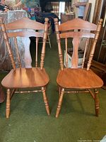 Two Victoriaville maple dining chairs front view
