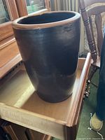 Full view of crock showing shape and glaze