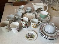 Overall view of assorted china pieces on table