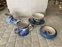 Group shot of all blue and white pottery pieces